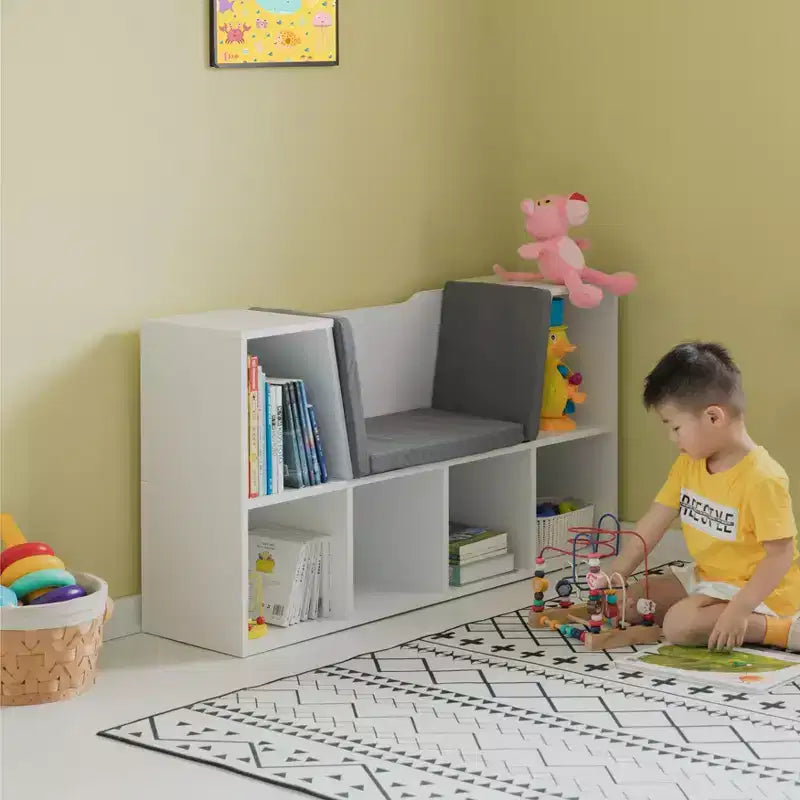 Étagère multifonction moderne avec espace de rangement et coin lecture rembourré gris